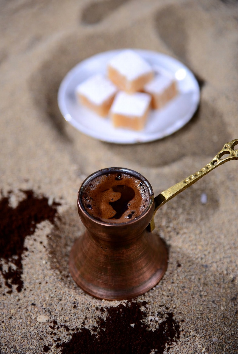 Turkish coffee with lokum on a plate